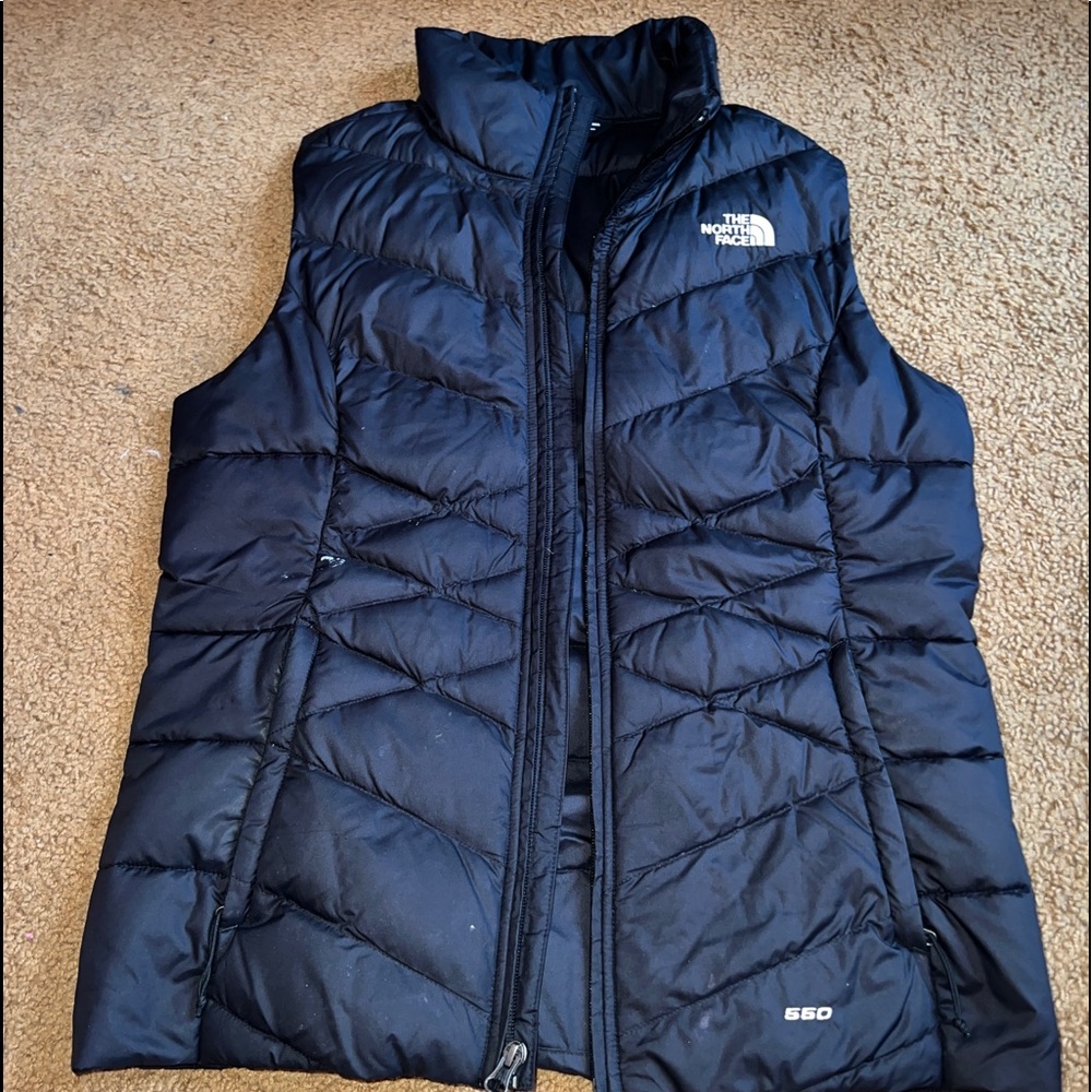 Black North Face vest, size medium.
